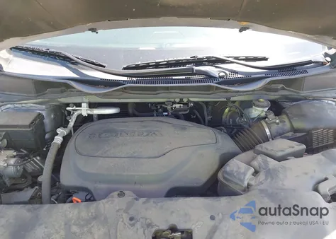 2022 Honda Odyssey Touring z USA, uszkodzony, nr VIN 5FNRL6H8XNB025847